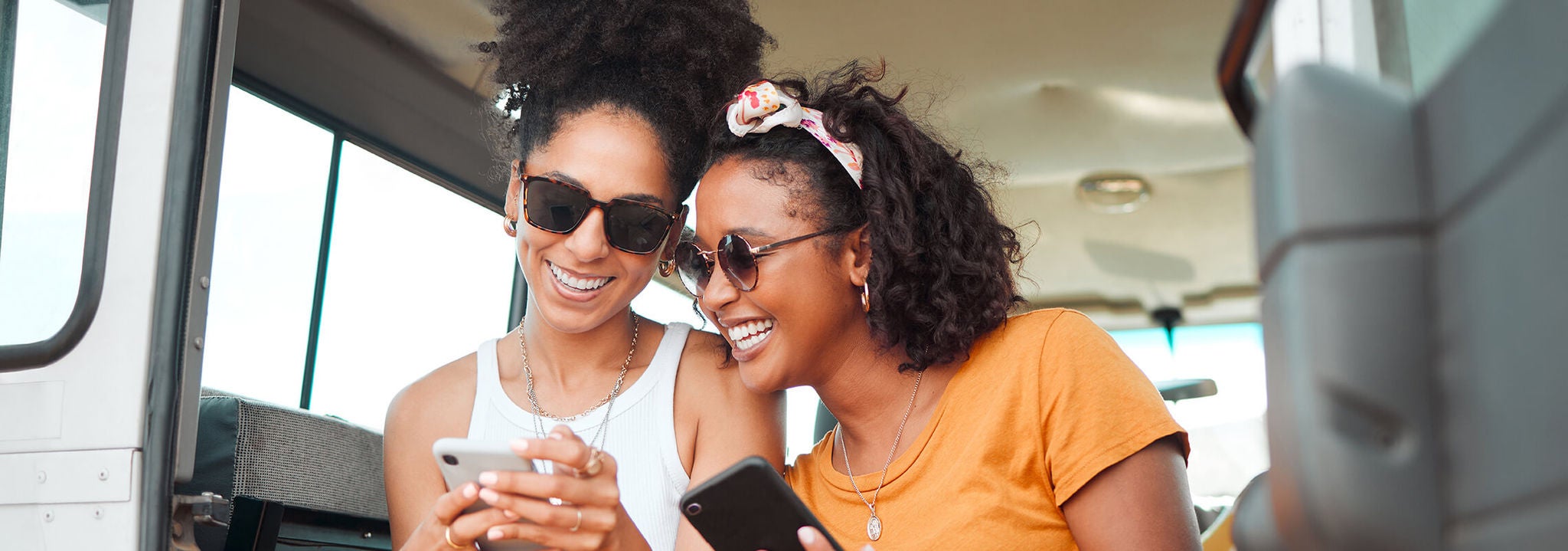 black girlfriends using cellphone desktop
