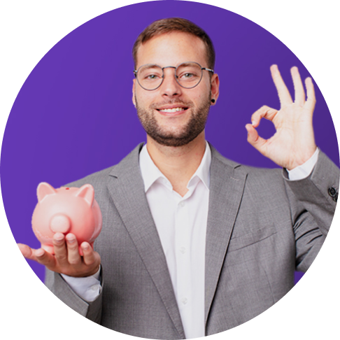 Man with glasses holding a piggy bank.