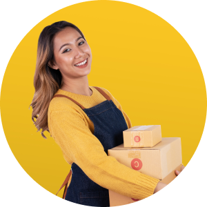 Woman carrying boxes with yellow background