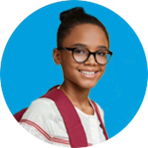 Little girl with glasses and backpack smiling