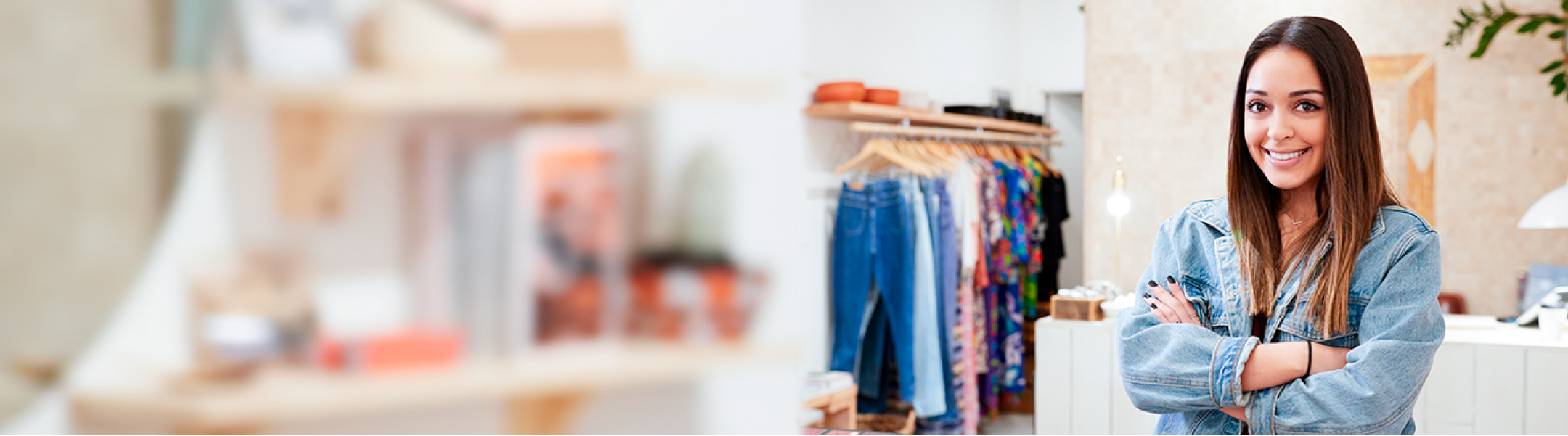 Woman smilling inside her store