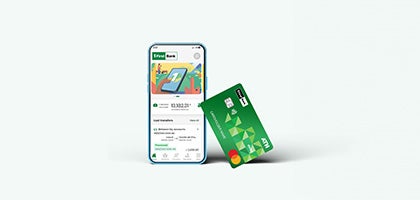 smartphone displaying  Digital Banking  app with a debit card on the side.