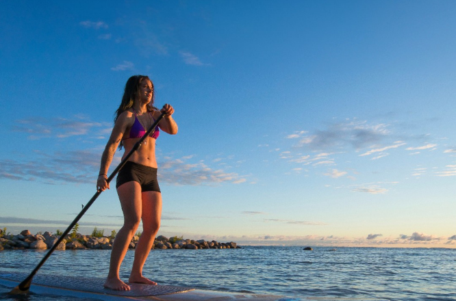 Woman paddleboarding