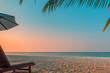 beach chair and a beach suring sunset