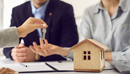 Couple receiving house keys