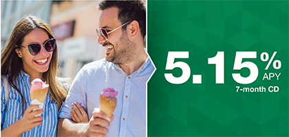 couple smiling with icecream in hand